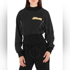 NWT black with white polkadots. Size large Balmain sweater style top.